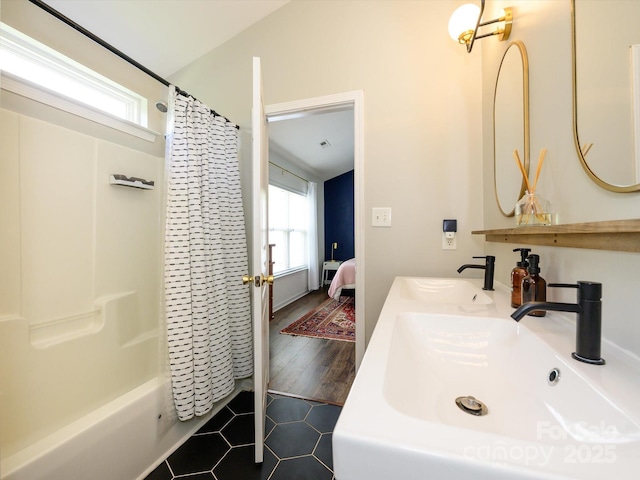 10639 Secret Garden Ln, Charlotte, NC 28214 - ensuite bathroom featuring tile patterned floors, shower / tub combo, and double vanity