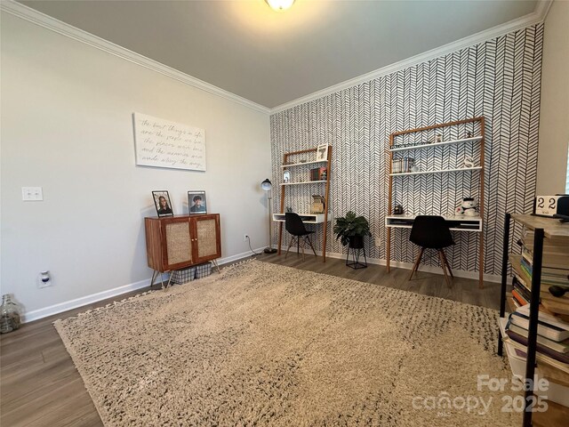 1016 Laggan Ln, Indian Trail, NC 28079 - office area with an accent wall, ornamental molding, baseboards, wallpapered walls, and wood finished floors