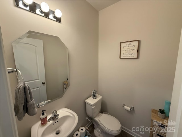 1016 Laggan Ln, Indian Trail, NC 28079 - bathroom featuring a sink and toilet