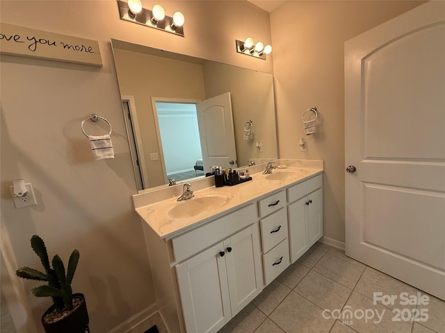 1016 Laggan Ln, Indian Trail, NC 28079 - full bath with double vanity, tile patterned flooring, and baseboards