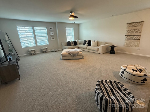 1016 Laggan Ln, Indian Trail, NC 28079 - carpeted living area with a ceiling fan and baseboards