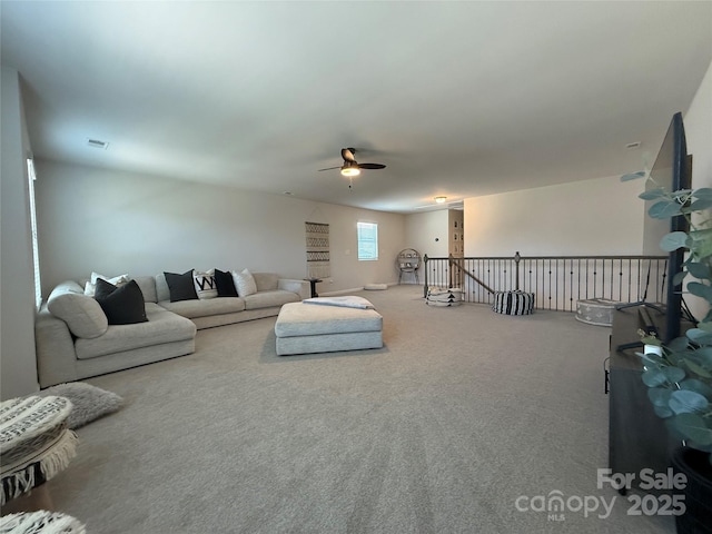 1016 Laggan Ln, Indian Trail, NC 28079 - living room featuring a ceiling fan and carpet