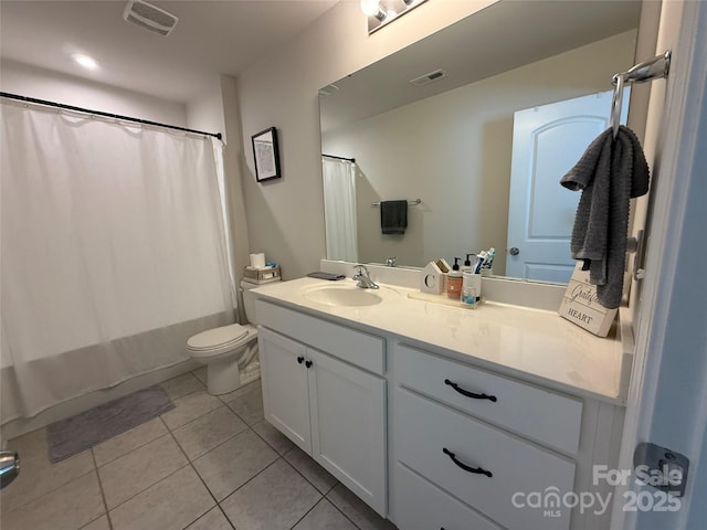 1016 Laggan Ln, Indian Trail, NC 28079 - bathroom with tile patterned floors, vanity, toilet, and shower / bathtub combination with curtain
