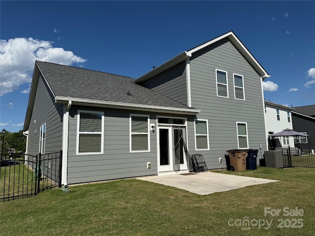 1016 Laggan Ln, Indian Trail, NC 28079 - rear view of house with a patio area, a shingled roof, and cooling unit