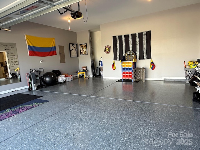 1016 Laggan Ln, Indian Trail, NC 28079 - garage featuring a garage door opener and electric panel