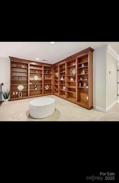 2234 Donnington Ln NW, Concord, NC 28027 - living area with light colored carpet and baseboards
