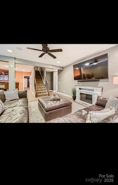 2234 Donnington Ln NW, Concord, NC 28027 - living area with a fireplace and a ceiling fan