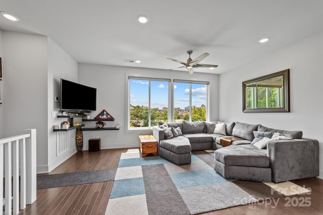 919 Cityscape Dr, Charlotte, NC 28205 - living area featuring plenty of natural light, recessed lighting, ceiling fan, wood finished floors, and baseboards