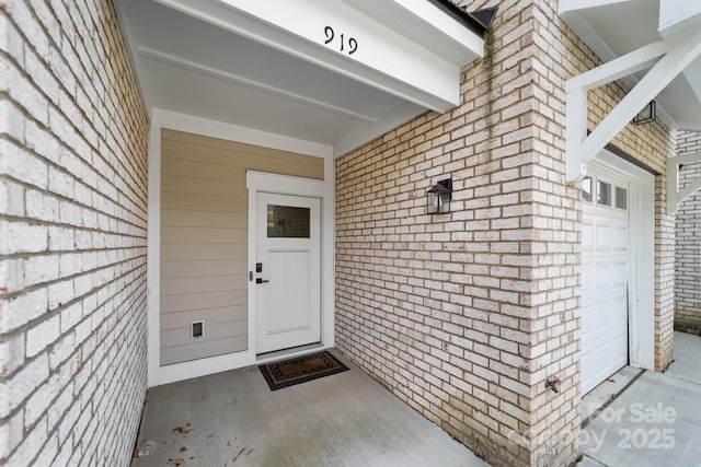 919 Cityscape Dr, Charlotte, NC 28205 - doorway to property featuring brick siding