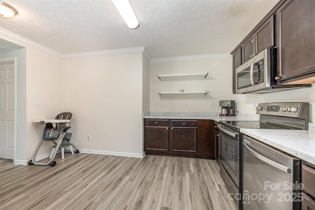 503 Apple St, Gibsonville, NC 27249 - kitchen featuring appliances with stainless steel finishes, light wood-type flooring, open shelves, dark brown cabinets, and crown molding