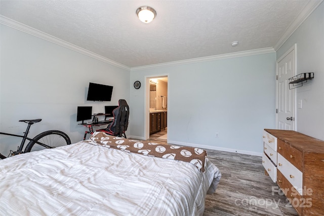503 Apple St, Gibsonville, NC 27249 - bedroom featuring ornamental molding, wood finished floors, baseboards, and a textured ceiling