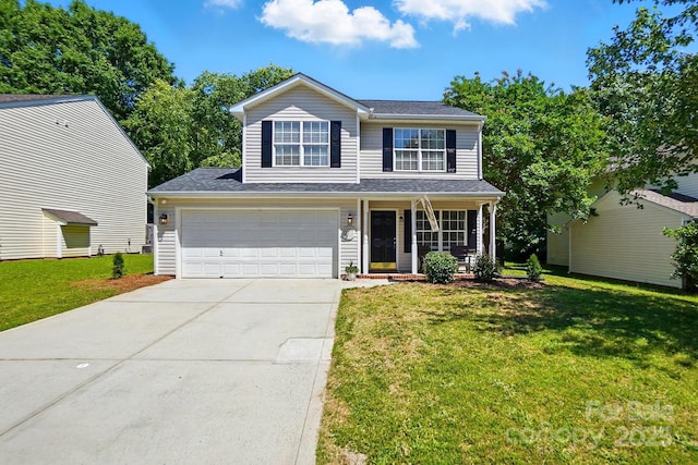 820 Settlement St, Clover, SC 29710 - traditional-style home featuring concrete driveway, a front lawn, covered porch, and a garage