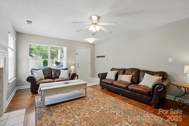 820 Settlement St, Clover, SC 29710 - living area with ceiling fan, a textured ceiling, and wood finished floors