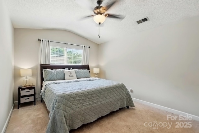 820 Settlement St, Clover, SC 29710 - bedroom with light colored carpet, vaulted ceiling, ceiling fan, and a textured ceiling