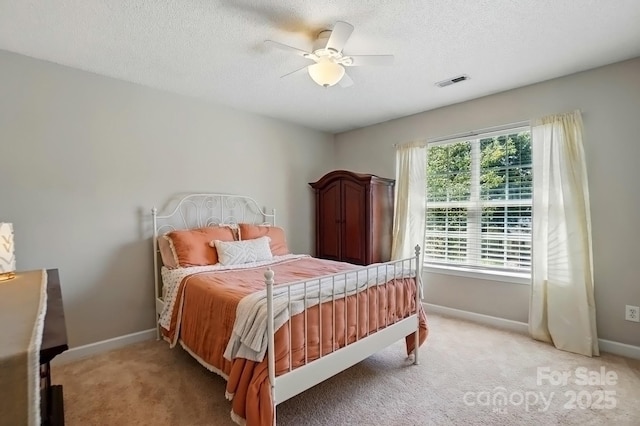 820 Settlement St, Clover, SC 29710 - bedroom featuring light carpet, ceiling fan, and a textured ceiling