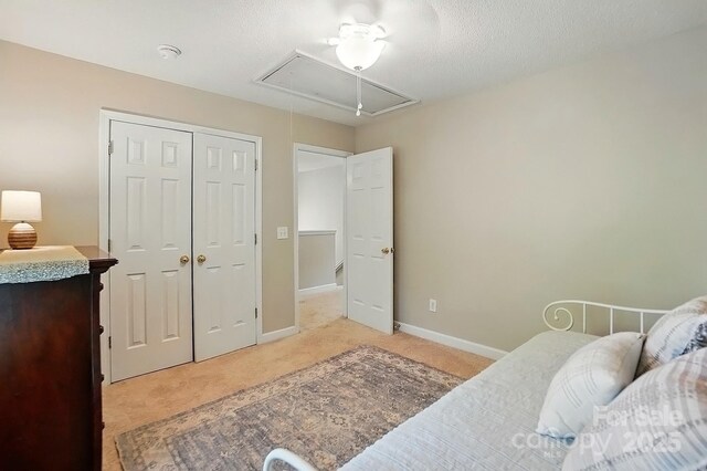 820 Settlement St, Clover, SC 29710 - bedroom with attic access, light carpet, and a closet