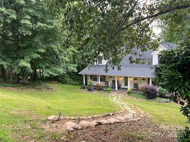 223 Tennessee Trl, Lincolnton, NC 28092 - view of front of property featuring covered porch, a front lawn, and a shingled roof