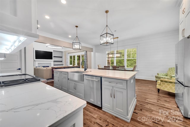 1622 Hunters Place Rd, York, SC 29745 - kitchen featuring appliances with stainless steel finishes, healthy amount of natural light, open floor plan, gray cabinets, and crown molding