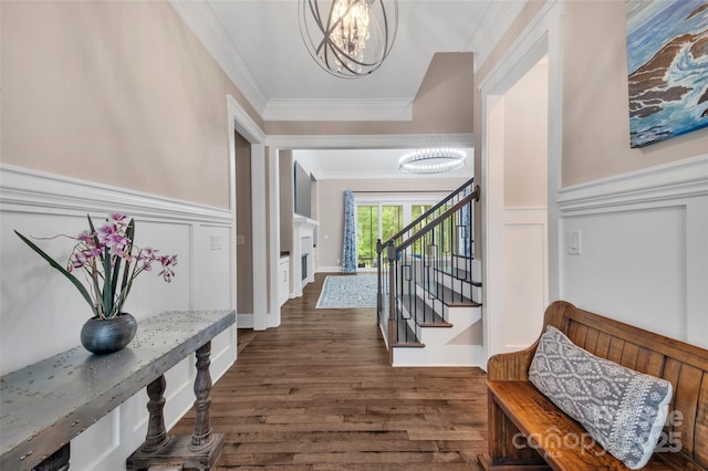 1622 Hunters Place Rd, York, SC 29745 - foyer with a chandelier, crown molding, wood finished floors, a decorative wall, and stairway