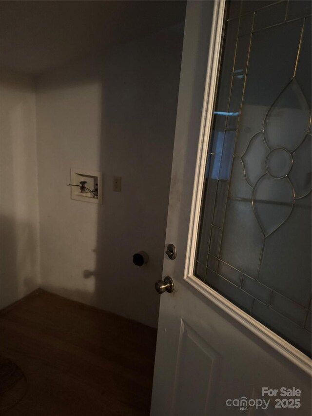 241 Hamrick Dr, Ellenboro, NC 28040 - laundry area with hookup for a washing machine and wood finished floors