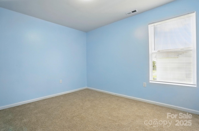 1005 Exodus Ct, Monroe, NC 28110 - carpeted spare room featuring baseboards