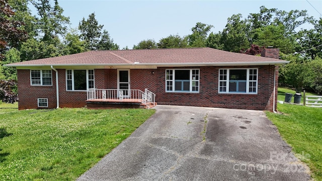3151 Lynn Mountain Rd, Vale, NC 28168 - single story home featuring a front lawn, a chimney, brick siding, and driveway
