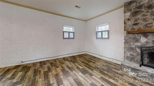 3151 Lynn Mountain Rd, Vale, NC 28168 - unfurnished living room with crown molding and wood finished floors