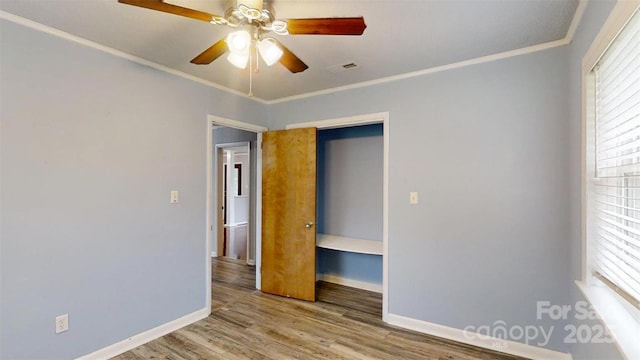 3151 Lynn Mountain Rd, Vale, NC 28168 - empty room featuring baseboards, crown molding, a ceiling fan, and wood finished floors