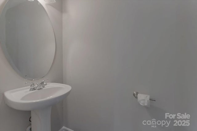 1111 Balcorn Pl, Charlotte, NC 28214 - bathroom featuring baseboards