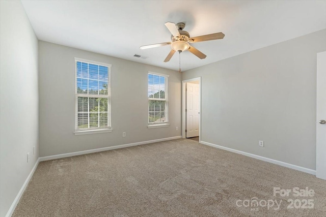 1111 Balcorn Pl, Charlotte, NC 28214 - carpeted empty room featuring ceiling fan and baseboards