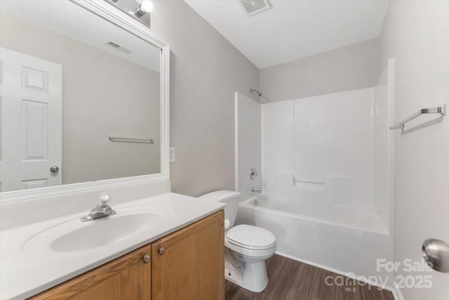 1111 Balcorn Pl, Charlotte, NC 28214 - full bathroom featuring toilet, vanity, bathing tub / shower combination, and wood finished floors