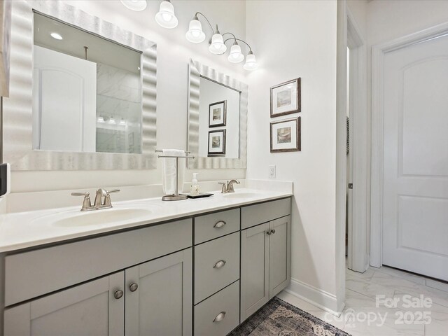 9405 Gladden Hill Ln, Pineville, NC 28134 - full bath with marble finish flooring, double vanity, baseboards, and a shower