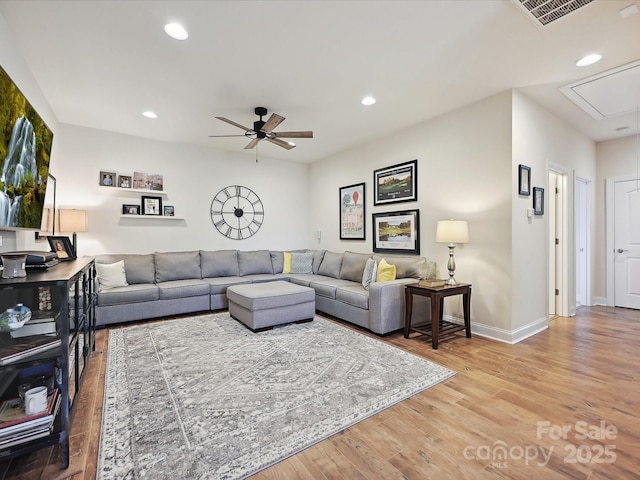 9405 Gladden Hill Ln, Pineville, NC 28134 - living area featuring attic access, wood finished floors, recessed lighting, a ceiling fan, and baseboards