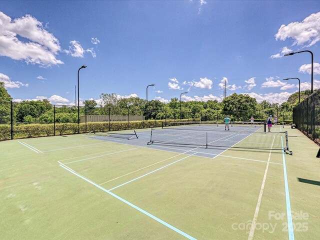 9405 Gladden Hill Ln, Pineville, NC 28134 - view of tennis court with community basketball court