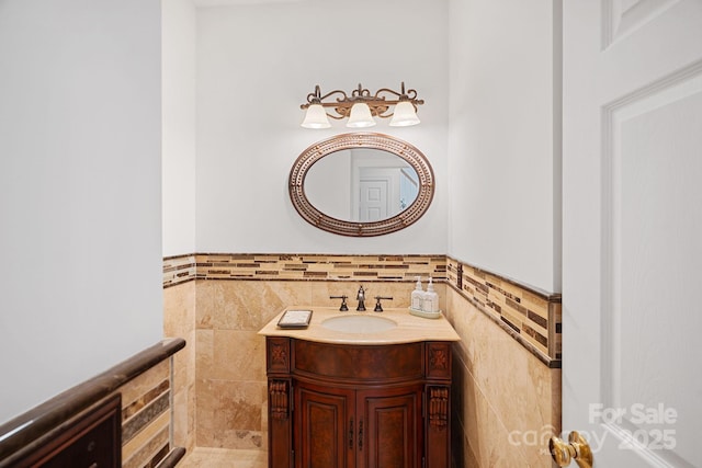 11917 Ulsten Ln, Huntersville, NC 28078 - bathroom with tile walls, vanity, and wainscoting