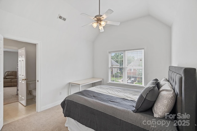 11917 Ulsten Ln, Huntersville, NC 28078 - bedroom with light colored carpet, lofted ceiling, a ceiling fan, and ensuite bathroom