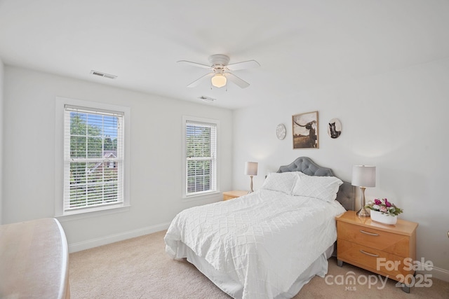 11917 Ulsten Ln, Huntersville, NC 28078 - carpeted bedroom with baseboards and a ceiling fan