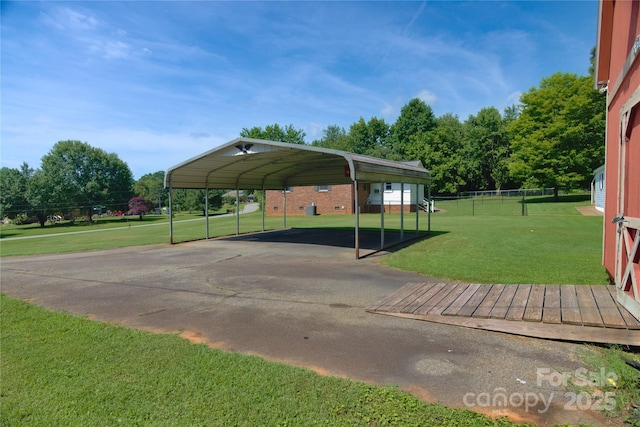 7869 Cherry Point Dr, Denver, NC 28037 - view of patio featuring a detached carport and asphalt driveway