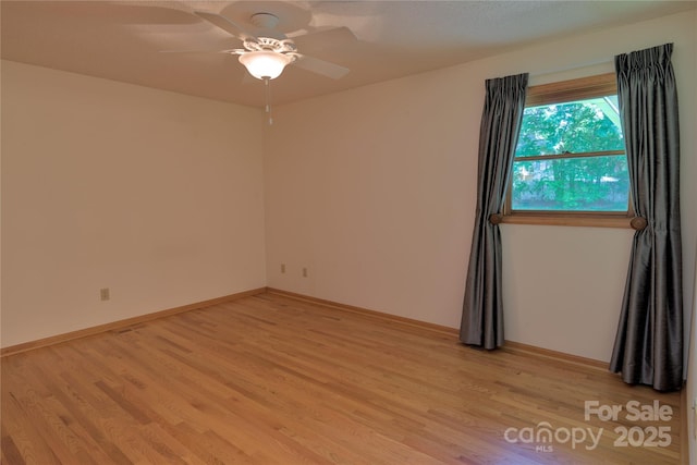7869 Cherry Point Dr, Denver, NC 28037 - empty room featuring light wood finished floors and ceiling fan