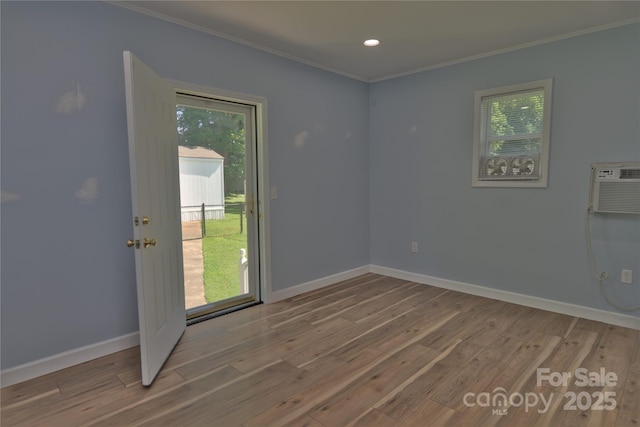 7869 Cherry Point Dr, Denver, NC 28037 - spare room featuring ornamental molding, wood finished floors, and recessed lighting