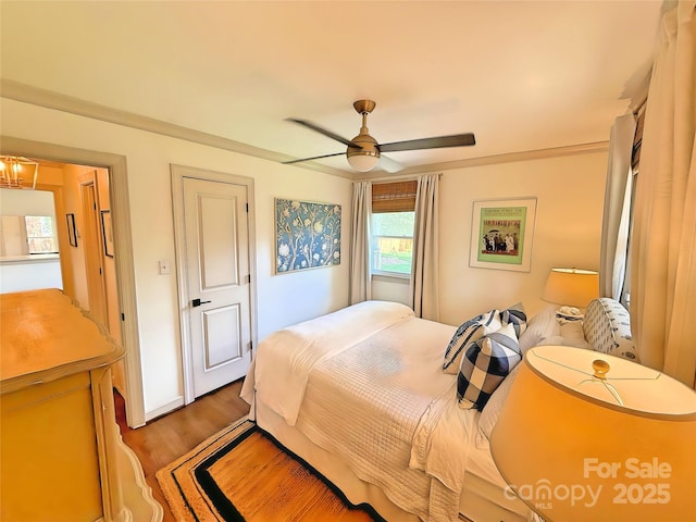 5033 Baylor Dr, Charlotte, NC 28210 - bedroom with wood finished floors and a ceiling fan