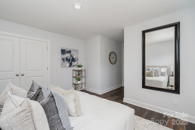 718 Lithia Inn Rd, Lincolnton, NC 28092 - bedroom featuring baseboards, dark wood-style floors, and a closet