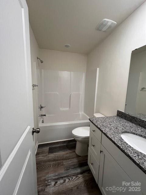 103 Higgins Ct, Morganton, NC 28655 - bathroom featuring vanity, wood finished floors, toilet, and shower / bath combination