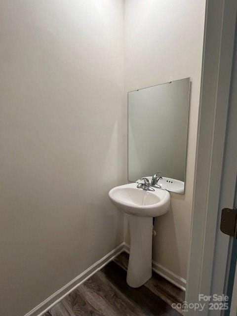 103 Higgins Ct, Morganton, NC 28655 - bathroom featuring wood finished floors and baseboards