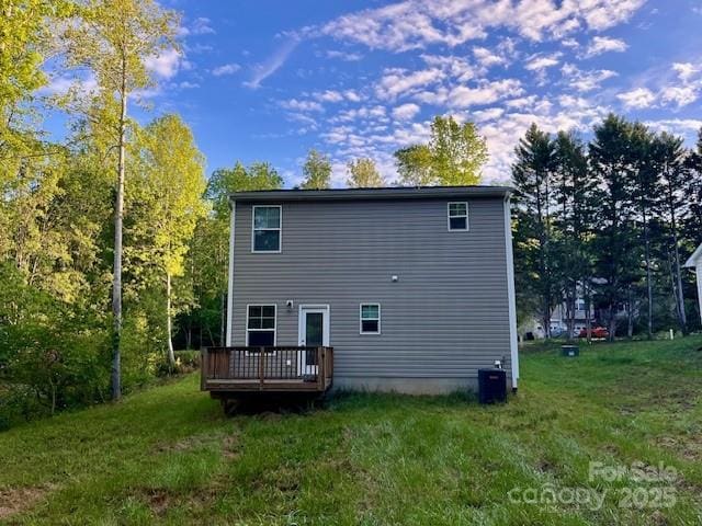 103 Higgins Ct, Morganton, NC 28655 - back of house featuring a wooden deck, a lawn, and central AC