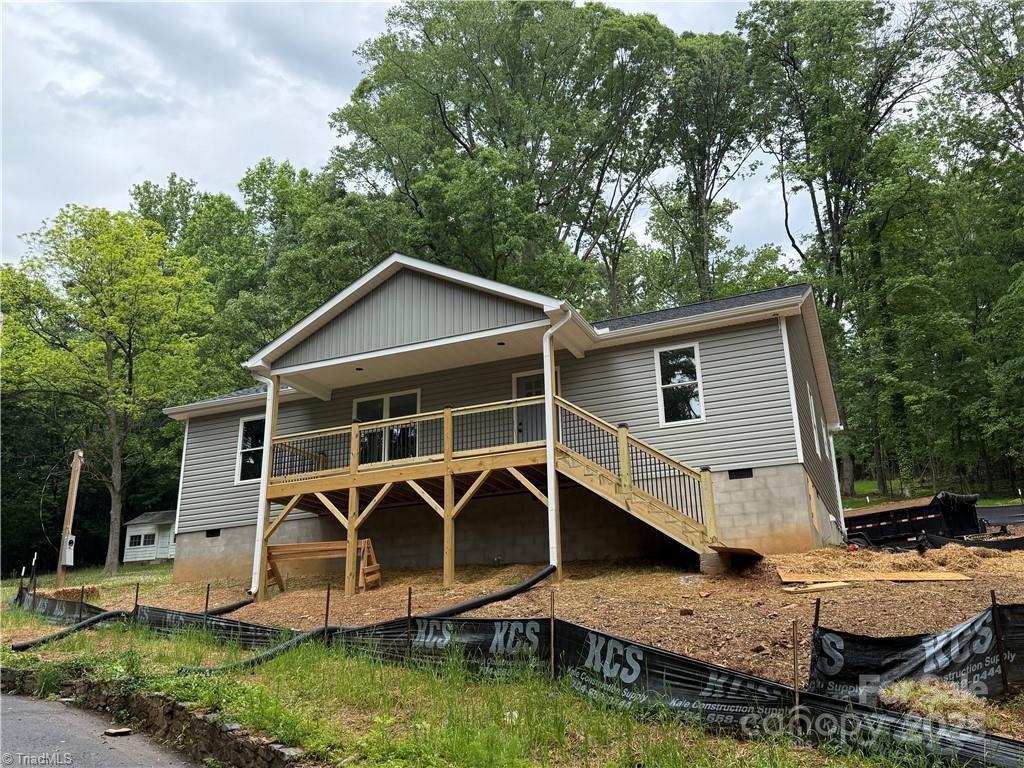 32874 Old Salisbury Rd, Albemarle, NC 28001 - rear view of property with crawl space, stairway, and a deck