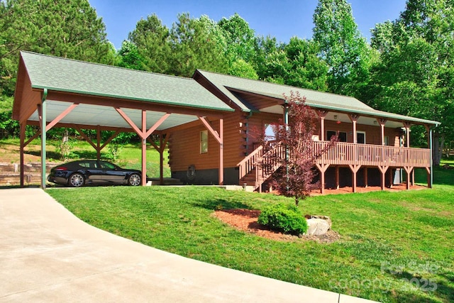 496 Moonlight Pass, Union Mills, NC 28167 - view of front of house with log siding, a front lawn, covered porch, and driveway