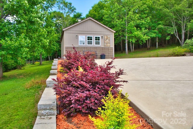496 Moonlight Pass, Union Mills, NC 28167 - view of front facade with a front lawn and concrete driveway