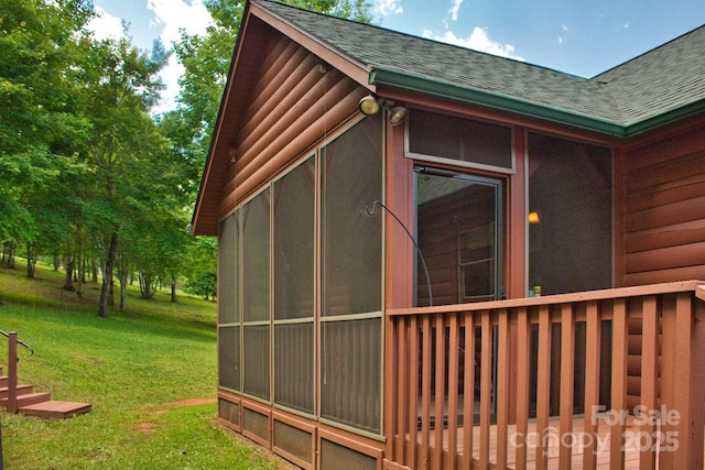 496 Moonlight Pass, Union Mills, NC 28167 - view of home's exterior featuring a shingled roof, a sunroom, and a yard