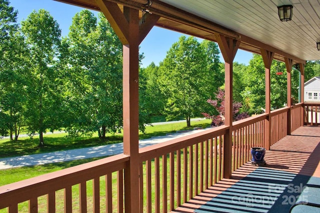 496 Moonlight Pass, Union Mills, NC 28167 - wooden deck featuring a lawn and view of wooded area